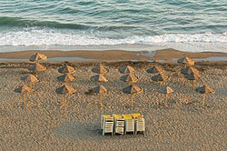 Landscape in Spain, parasols evening beach rincon de la victoria andalusia
