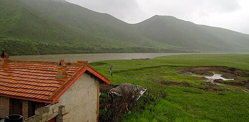 The river Yellow River (Huang He), rustic home